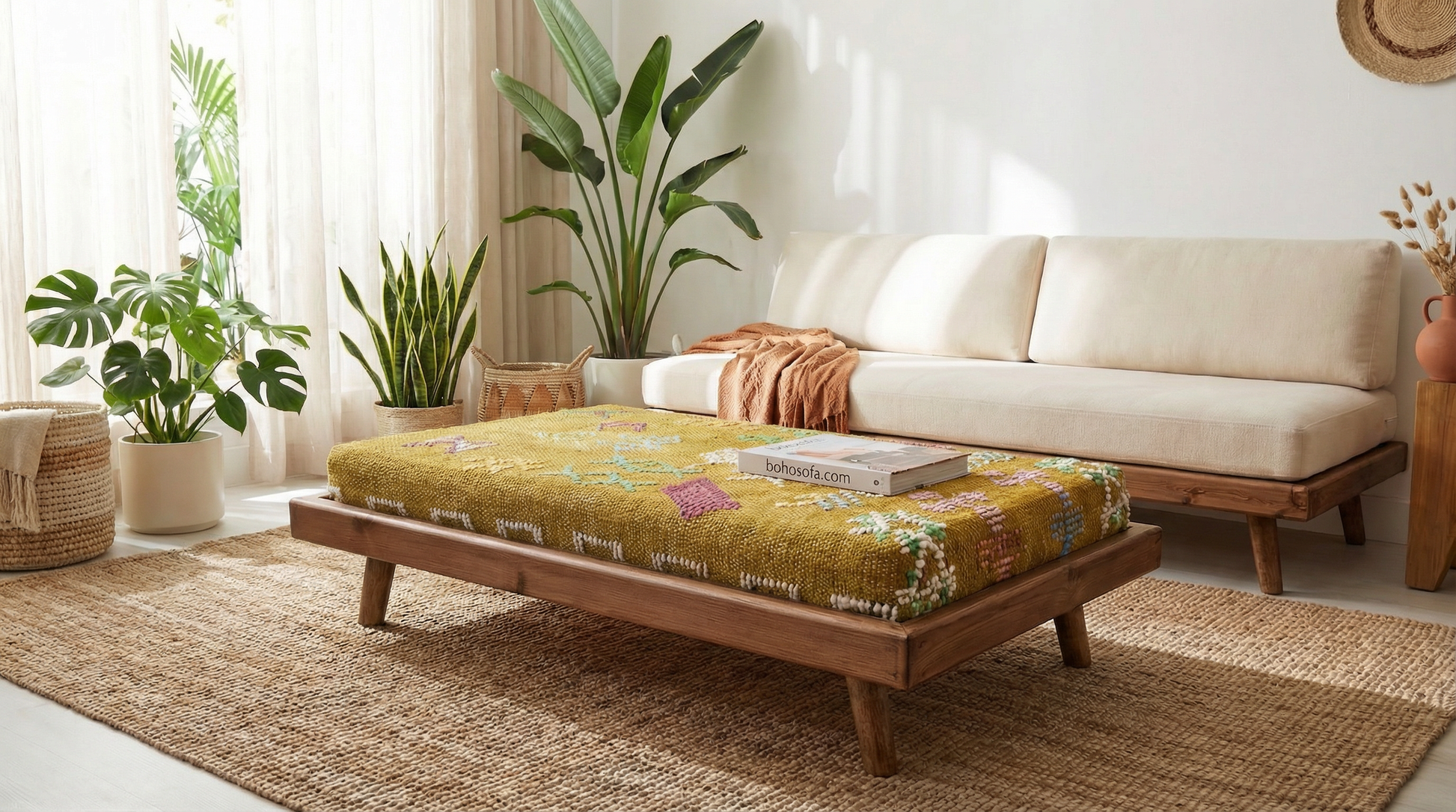 Living room with a wooden modern coffee table, white sofa, and potted plants.
